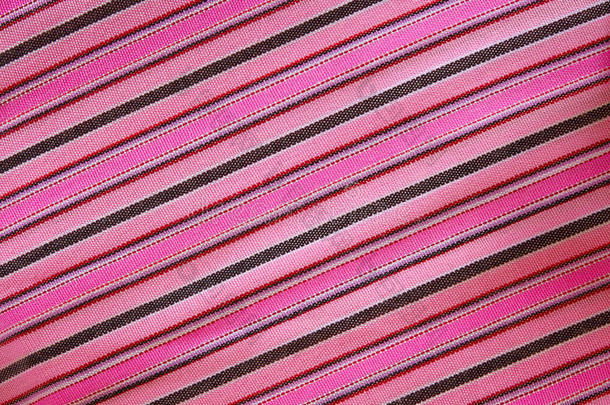 背景条纹粉红色织物。 纹理图案材料。