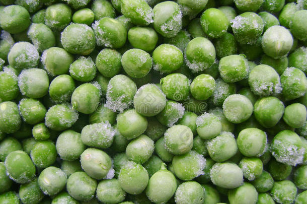 冷冻豌豆。 豌豆绿色食品农业新鲜纹理照片库存