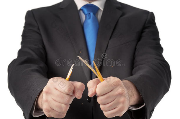 商务人士折断铅笔