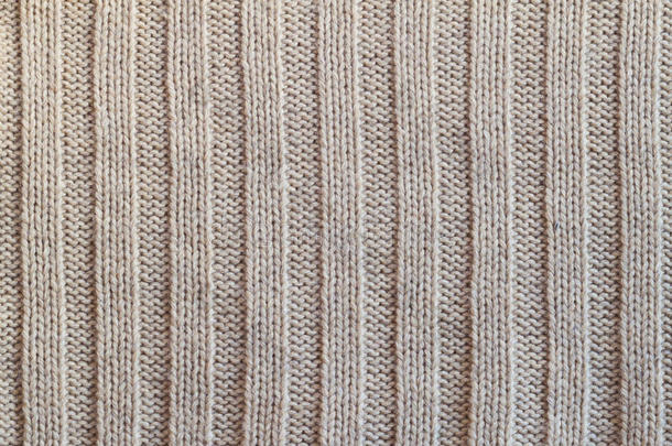 奶油针织羊毛保暖衣服为冬季织物纹理