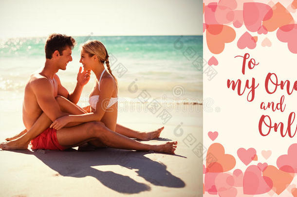 在海滩上拥抱情侣和情人节单词的复合图像