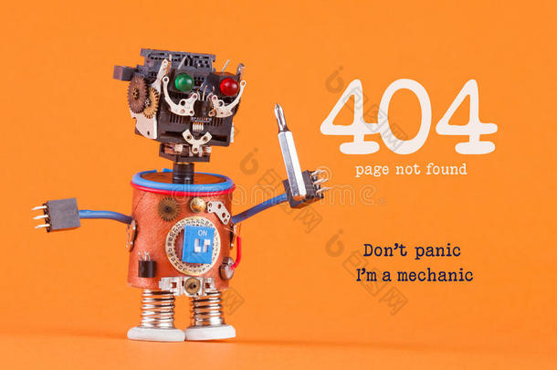 404错误页没有找到概念。 别`惊慌我`是个机械师。 带司机的机器人杂工。 宏观视图，橙色