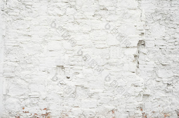 抽象的粗糙的空背景。白色空白砖墙纹理的照片。 空白水泥表面水平。