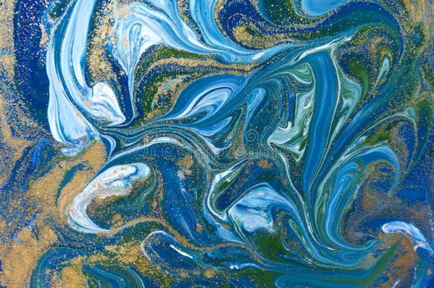 蓝色，绿色和金色液体质地。 手绘大理石<strong>花纹背景</strong>。 墨水大理石抽象图案
