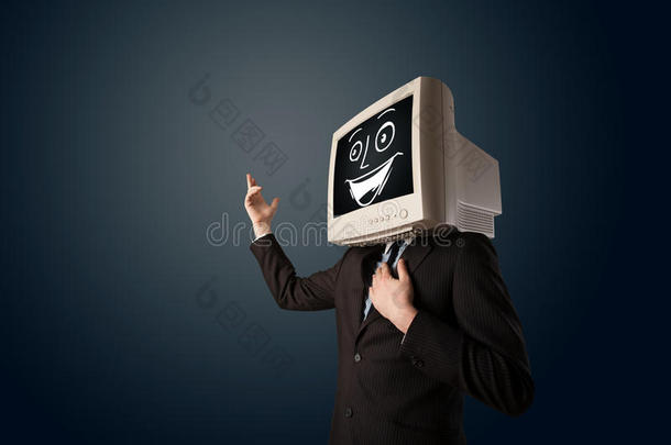 一个快乐的商人有一个电脑显示器头和一个笑脸