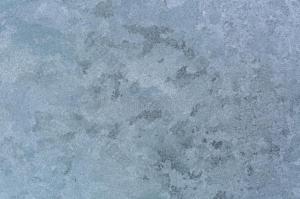 玻璃W上霜冻冰纹的抽象纹理背景