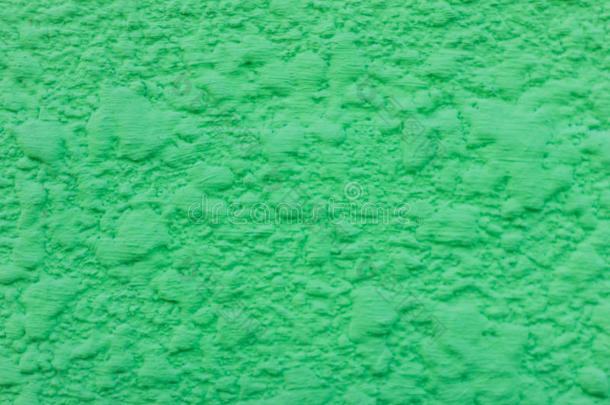 墙上的绿色装饰石膏。 艺术格里恩背景。