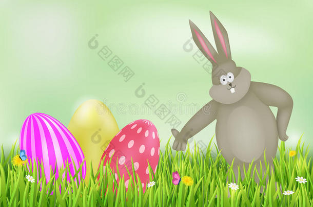 背景是复活节彩蛋和兔子。