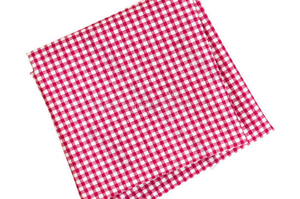 格子红色和白色餐巾纸或折叠桌布隔离在上面