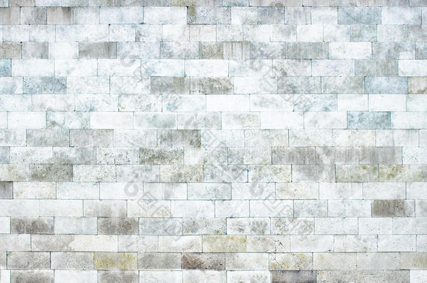 灰色大理石砌块墙，石材质地轻盈为背景