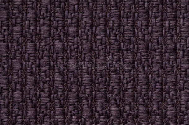 深紫色针织羊毛背景，图案柔软，蓬松的布。 纺织品特写的纹理。