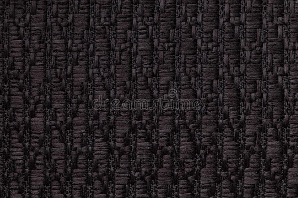 黑色针织羊毛背景，图案柔软，蓬松的布。 纺织品特写的纹理。
