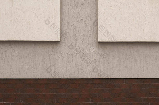 建筑上米色石膏墙的碎片