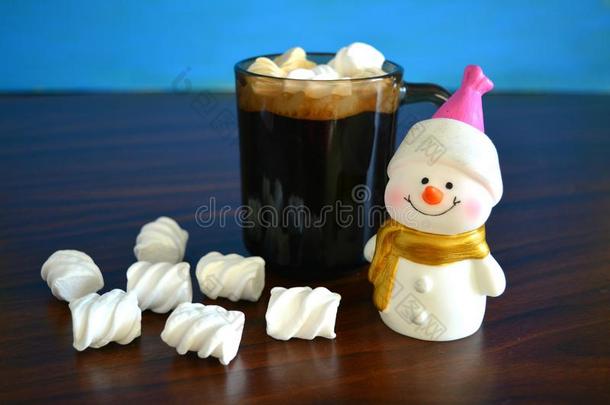 圣诞节雪人和咖啡豆杯子和甜的