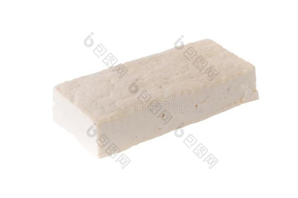 大豆奶酪豆腐将切成小方块隔离的向白色的背景