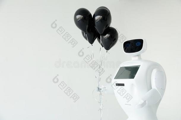 指已提到的人机器人保存气球采用它的手.幸福的生日.Cyberneti