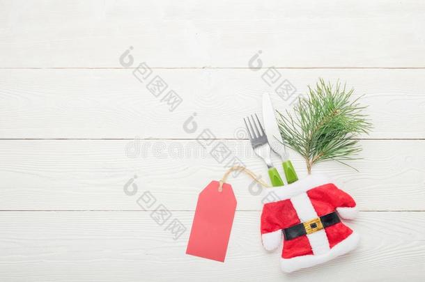 圣诞节正餐表镶嵌价格观念.餐叉和刀