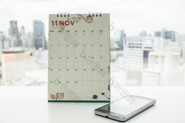 十一月日历和智能手机为会议和约定