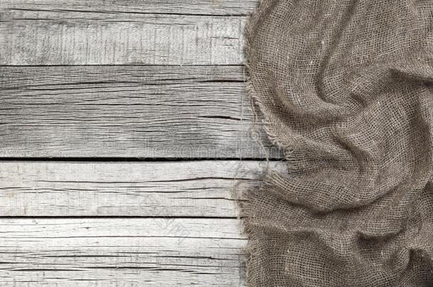 粗麻布向老的灰色木制的背景