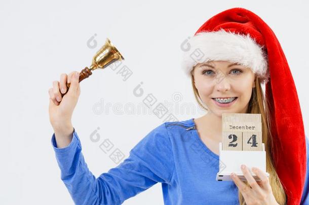 圣诞节女人佃户租种的土地日历和钟