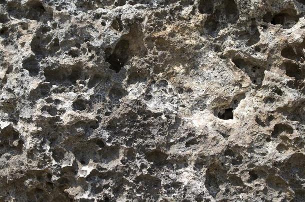 灰色的自然的石头质地照片背景.火山的石头文本