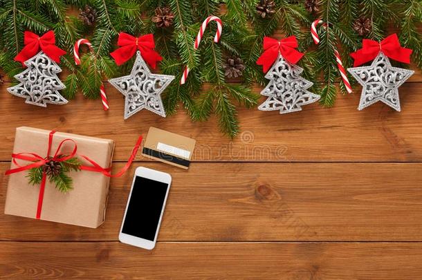 支付的为圣诞节礼物和智能手机背景