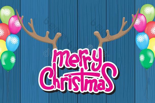 愉快的圣诞节字体设计和鹿角和木材后面