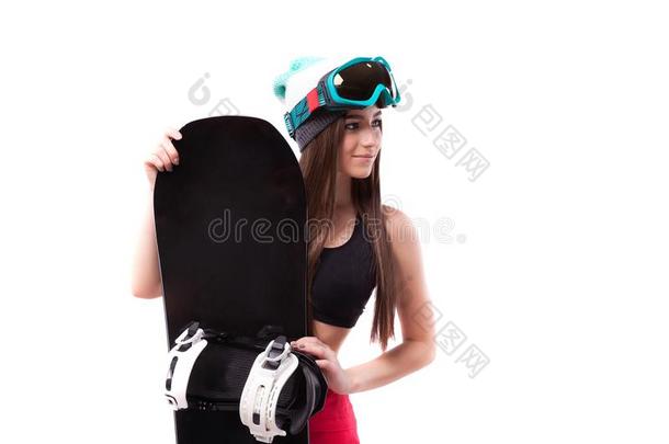 年幼的漂亮的女人采用黑的短的油箱顶拿住滑雪板