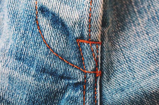 斜纹粗棉布牛仔裤背景和接缝关于牛仔裤时尚设计.