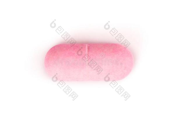 粉红色的药丸从在上面隔离的向白色的