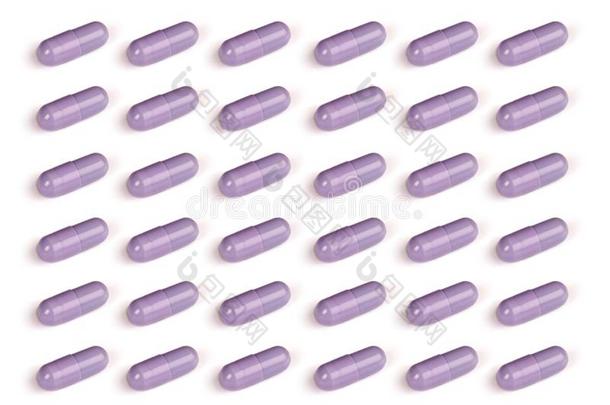 紫色的药丸隔离的向白色的