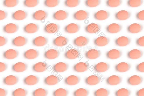 鲑鱼粉红色的药丸隔离的向白色的