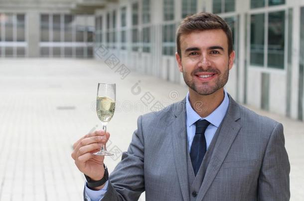 商人喝彩和香槟酒玻璃