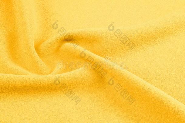 质地,背景,模式.黄色的丝织物.光滑的优美的