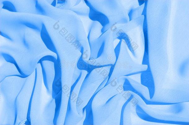 背景质地,模式.蔚蓝蓝色丝斜纹织物.在这里是（be的三单形式一demand需要