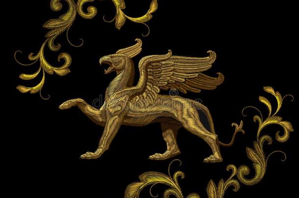 金色的织地粗糙的刺绣狮身鹫首的怪兽纺织品补丁设计.