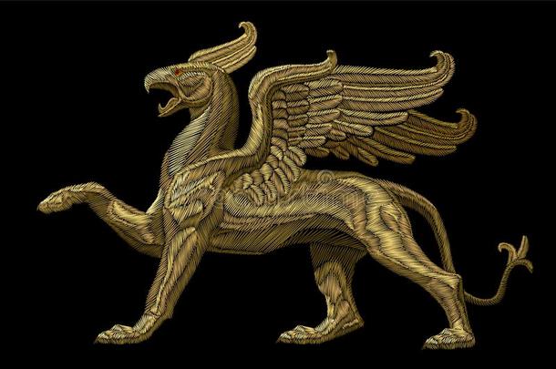 金色的织地粗糙的刺绣狮身鹫首的怪兽纺织品补丁设计.时尚