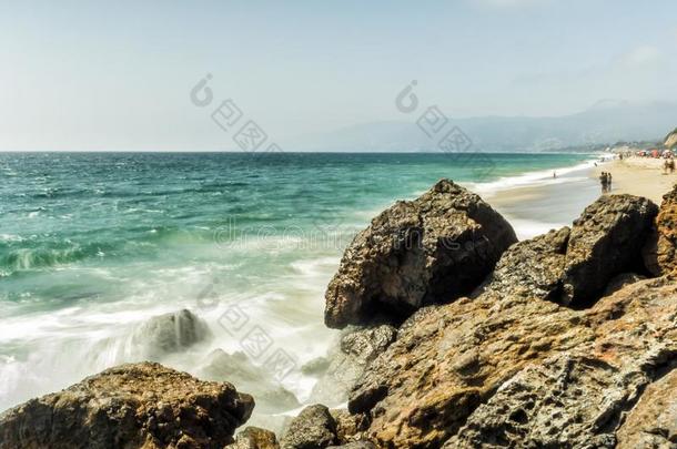 波打指已提到的人岩石在<strong>祖玛</strong>海滩,长的暴露,丝w在er