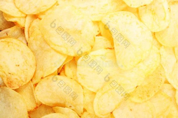 炸马铃薯条模式.黄色的盐腌的马铃薯炸马铃薯条同样地背景.炸马铃薯条英语字母表的第20个字母