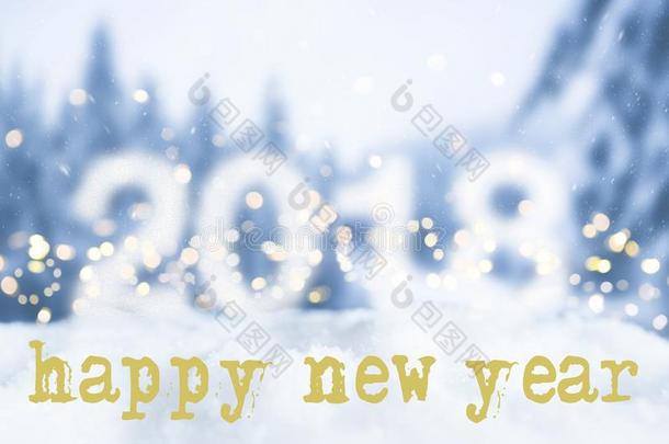 幸福的新的年招呼卡片和下雪的焦外成像背景
