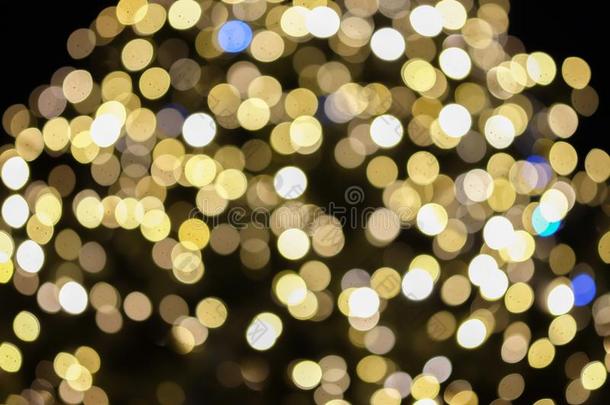 抽象的圣诞节背景和金色的焦外成像.