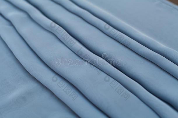 颜色蓝色德克斯蒂尔,丝织物和褶