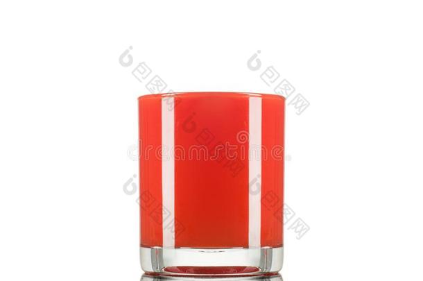 玻璃关于使溅起番茄果汁隔离的向白色的.番茄溅起