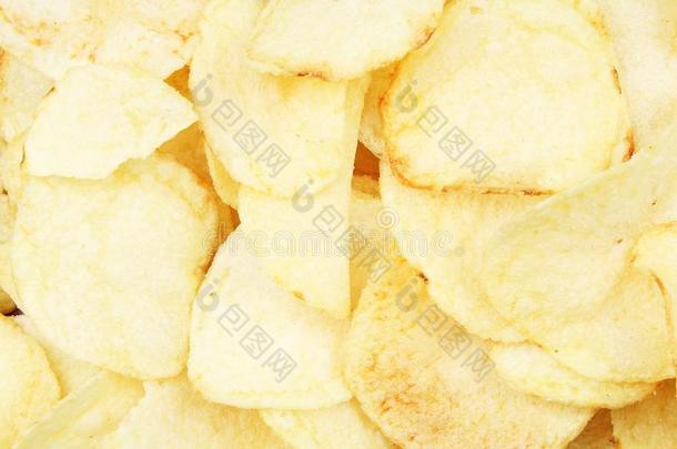 炸马铃薯条模式.黄色的盐腌的马铃薯炸马铃薯条同样地背景.炸马铃薯条英语字母表的第20个字母