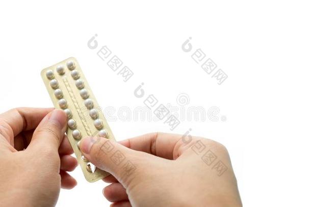 女人手迷人的出生控制药丸或避孕用具药丸