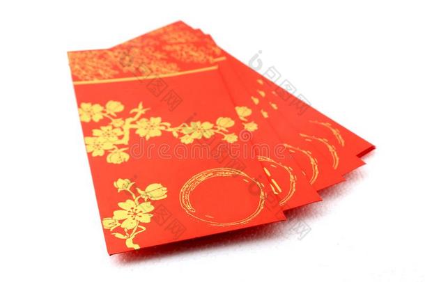 红色的信封为中国人新的年庆祝越过白色的后面