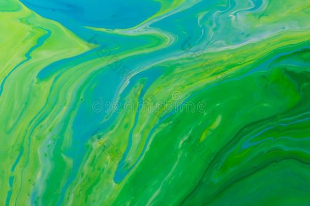 绿色的和<strong>蓝色</strong>颜色大理石混合的墨水抽象.