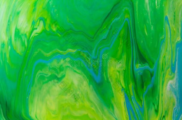 绿色的和蓝色颜色大理石混合的墨水抽象.