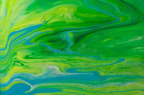 白色的,绿色的和<strong>蓝</strong>色颜色大理石混合的墨水抽象.