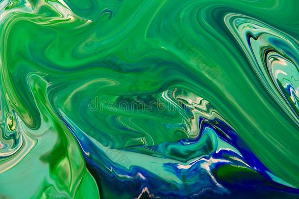 白色的,绿色的和<strong>蓝</strong>色颜色大理石混合的墨水抽象.